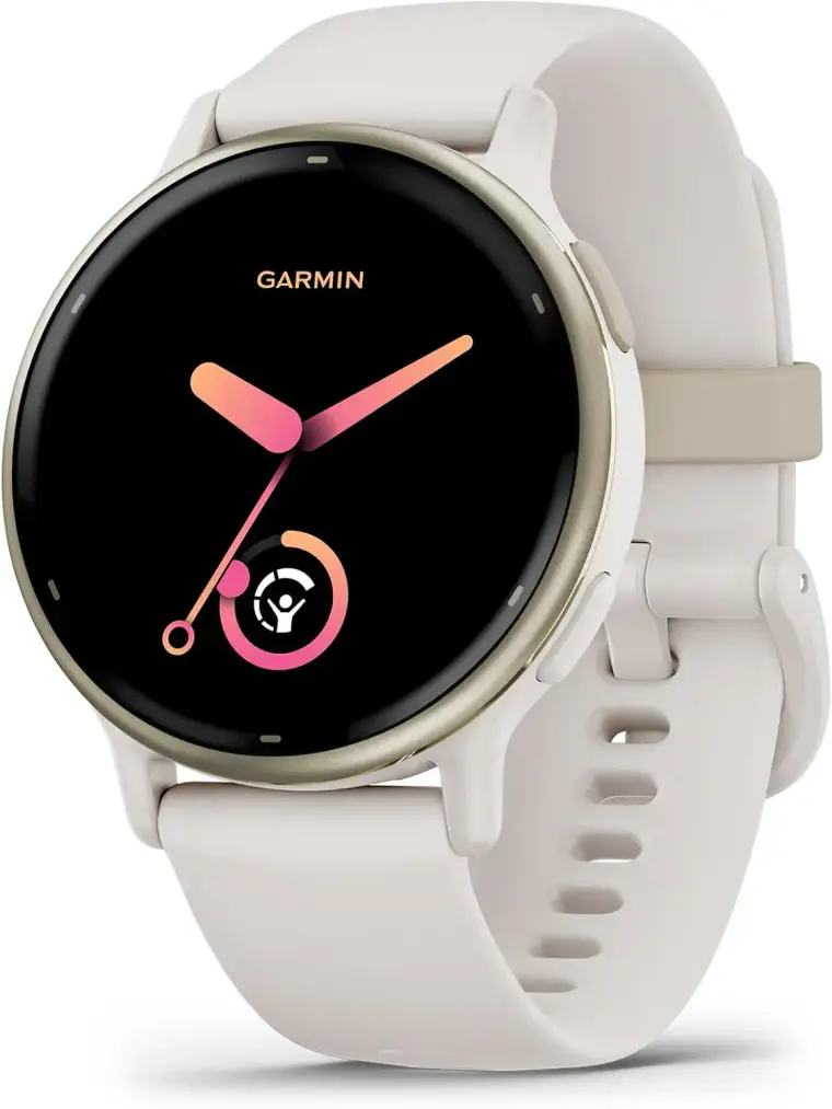 Garmin smartwatch with a cream silicone band, gold-trimmed black face, pink hands, and fitness activity icon; sleek, elegant design.